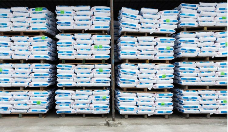 Powder resin bags stacked in warehouse